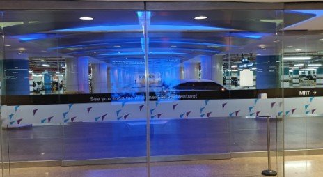 Walk pass the glass doors and turn right for the MRT.