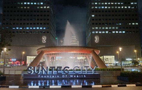 Walk straight outside to between Tower 2 and 3 to see the outside of the Fountain of Wealth.