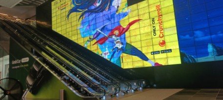 Turn right and go up the long escalator to the Convention Centre.