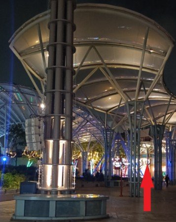 Follow the sheltered walkway to walk straight towards the Resorts World Sentosa building.