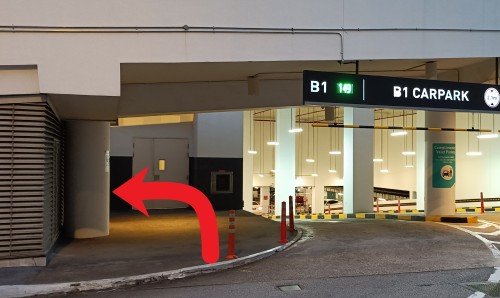 With the entrance of B1 CARPARK on your right, walk to the side of the VivoCity and turn left.