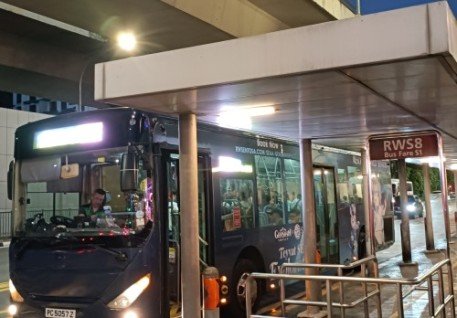 Board the bus at the RWS8 bus stop.