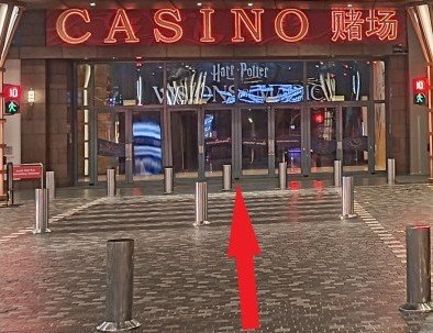 Cross the two roads at the traffic lights to reach Resorts World Sentosa's doors.