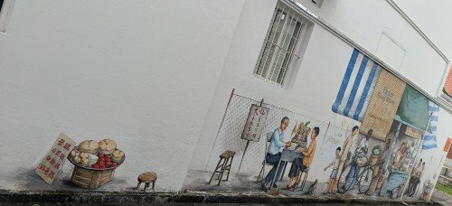 叶耀宗创作的巴刹和算命先生壁画。